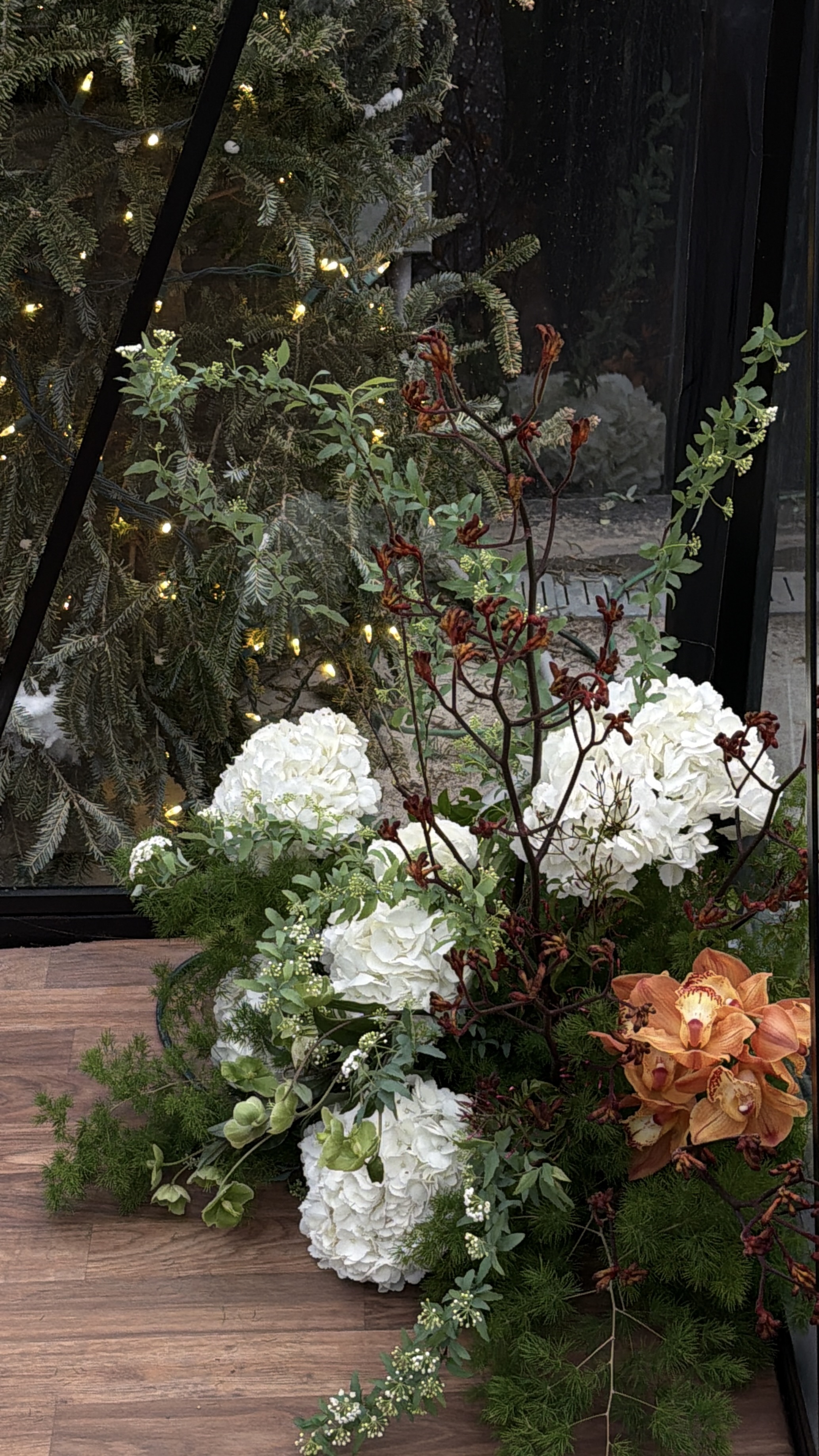 White hydrangea and orchid arrangement